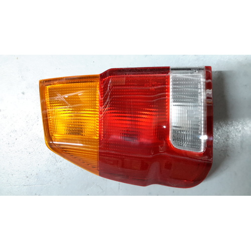 Tail light LHS to suit Mitsubishi PA Challenger - BRAND NEW GENUINE - MR296607